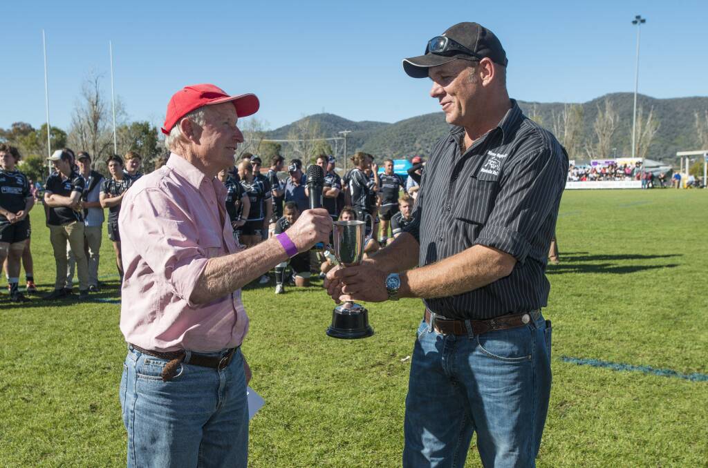 HONOUR: Central North president Tony Byrnes presents Moree Bulls president Paul King with the prestigious President's Cup at the 2017 grand final. Photo: Samantha Newsam