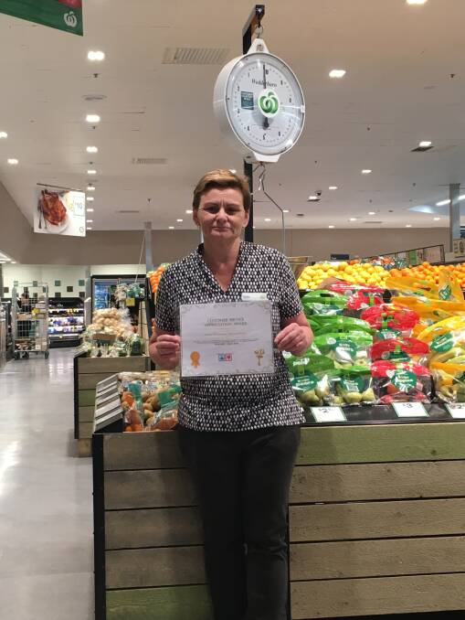 THUMBS UP: Woolworths Moree assistant store manager Kylie Heffernan received the May Moree Thumbs Up Thumbs Down Customer Service Appreciation Award.