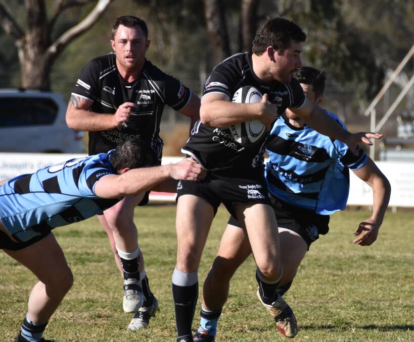 RE-MATCH: Moree Bulls second grade side will be hoping for a repeat of their winning performance against the Narrabri Blue Boars recently, when the two sides meet in the major semi-final on Saturday. Pictured is Moree's Jordan Cosh, flanked by Ben Williams.