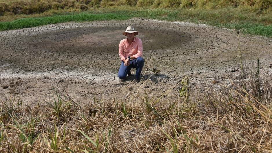 DROUGHT: NSW Primary Industries Minister Niall Blair in an empty dam at Stroud during a farm tour in February 2018. Picture: Belinda-Jane Davis