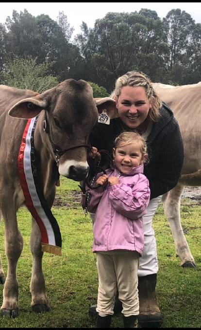 Dairy farmer Natasha Yarrington, with her youngest daughter Layla, has been informed she has to pay back the Farm Household Allowance for 2015/16.