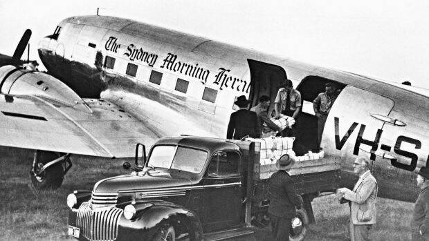 A PIECE OF HISTORY: A RAAF road convoy is set to carry a C-47 (DC-3) similar to this Sydney Morning Herald DC-3 through Gunnedah on it's way to the RAAF base in Amberley, Queensland. Photo: Fairfax Archives 