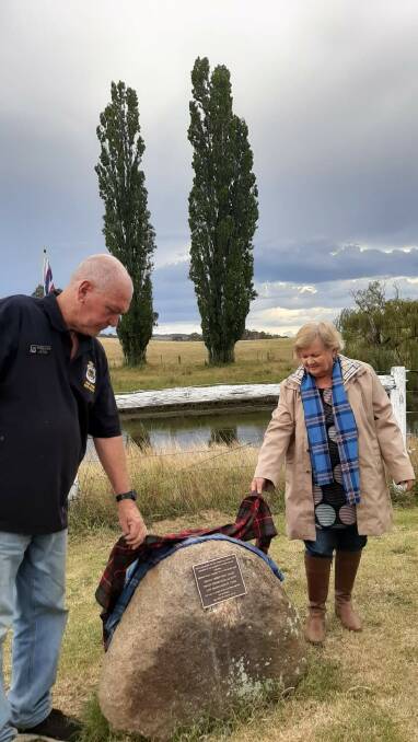 REMEMBERING LIVES LOST: Gordon Taylor president of the New England district RSL unveils the memorial with Glen Innes Mayor Carol Sparks: Photo supplied.