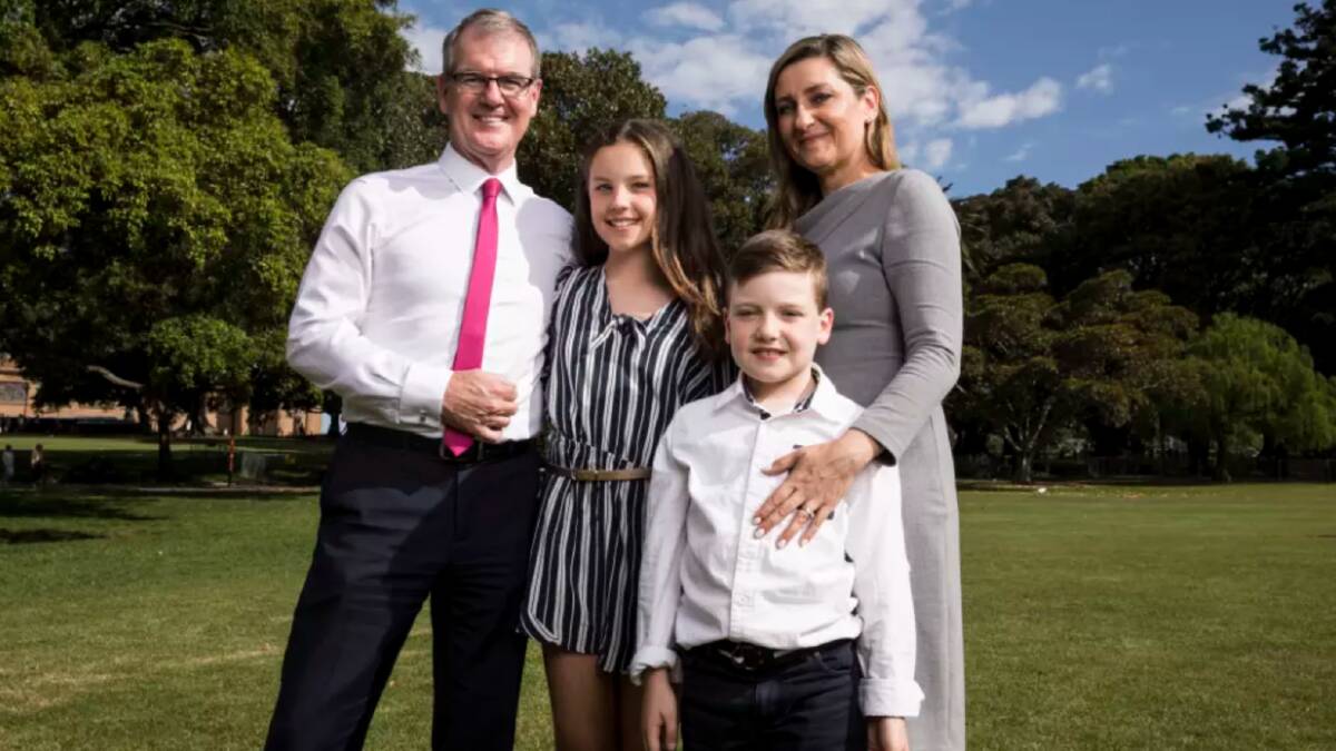 The new NSW Opposition Leader Michael Daley with his wife Christina and children, Olivia and Austin. Photo: Dominic Lorrimer