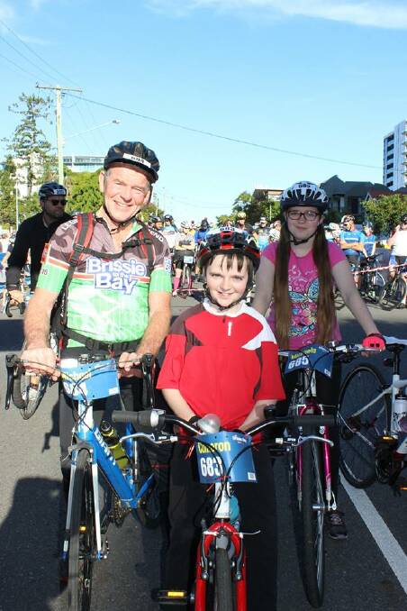 MOMENT OF PRIDE: Mick, Cameron and Michaela Langan recently rode 25km as another way to "give back" after the support their family received during Cameron's battle with a form of cancer.