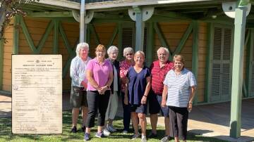 Members of Moree and District Historical Society Cheryl Timmins, Jenny Pritchard, Vicki Marshall, Allan Jenkins and (front) Lauren Winkley, Sue Greenaway and Denise Jenkins and inset, Dr Hollingworth's mobilisation form.