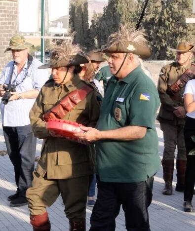 LEST WE FORGET: Jack Stacey's great-grandson, Lance Waters, and Elsie Amamoo lay a wreath at Semakh Railway Station. Stacey took part in the Charge of Beersheba.
