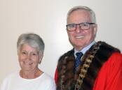 Moree Mayor Mark Johnson presents Lyn Moore with her award at a lunch at Moree and District Services Club on Wednesday, March 13. Ms Moore says she was surprised and honoured by the award. Photo supplied 
