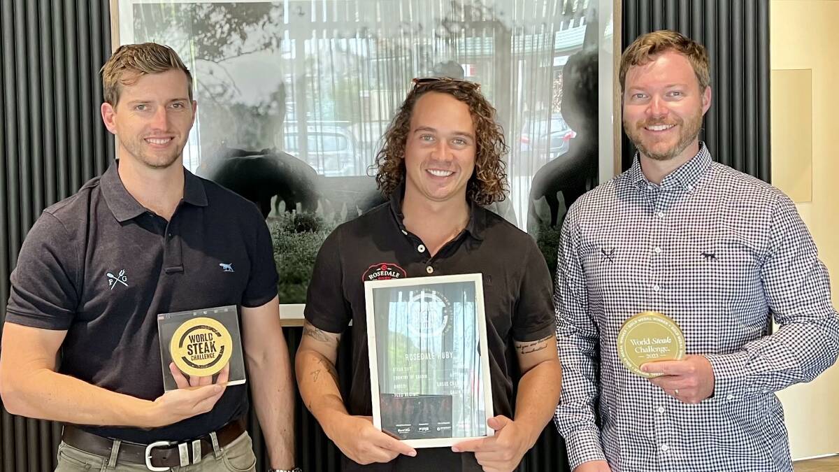 From left Providore Global sales manager Chris Bowtell, general manager Lachlan O'Connor and chief financial officer Michael Hart with their winning medals and trophy.
