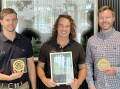 From left Providore Global sales manager Chris Bowtell, general manager Lachlan O'Connor and chief financial officer Michael Hart with their winning medals and trophy.