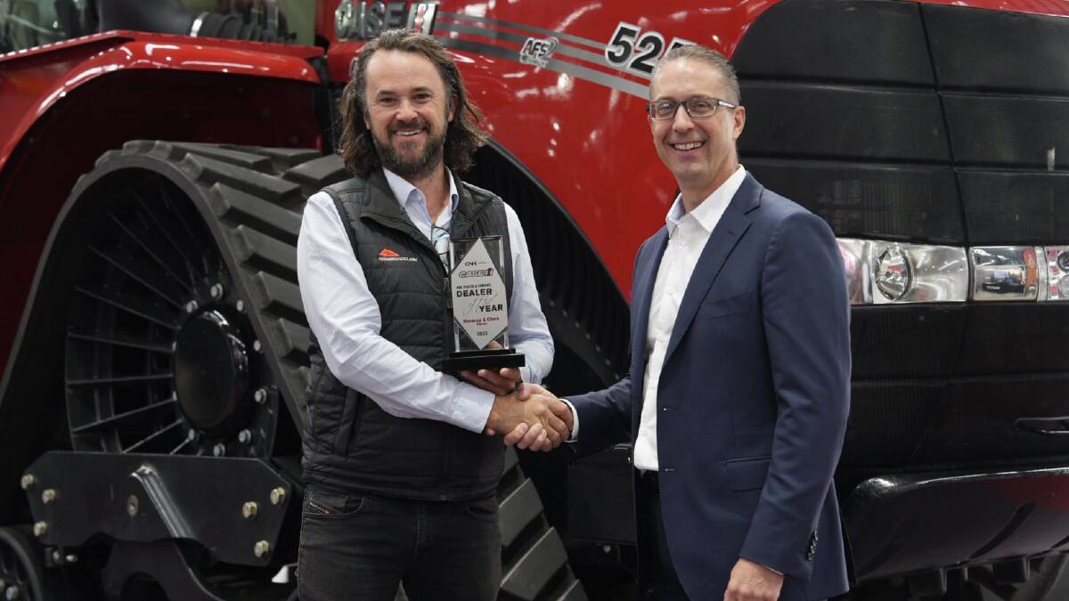 Kenway and Clark chef executive Pete McCann receives the Case IH parts and service Dealer of the Year award from CNH head of parts and service ANZ Heath Joiner. Picture supplied