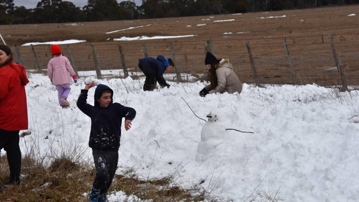 Kids from Gravesend see snow for the first time as people flock to tablelands