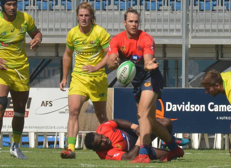 SEVENS ACTION: Moree's Josh Walker plays for Australia Pacific against Australia at the Festival of Rugby on Friday.