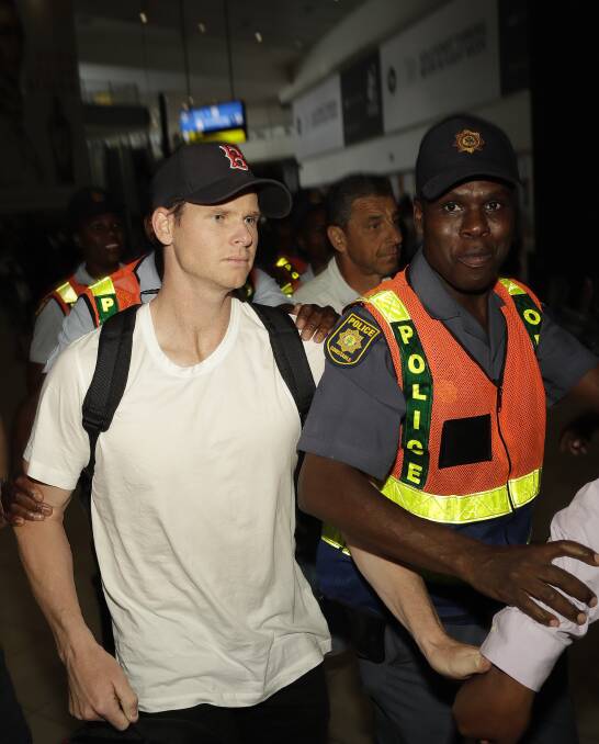 RETURN OF THE FALLEN: Steve Smith leaves South Africa en route to Australia and his emotion-charged media conference. Photo: AP/Themba Hadebe