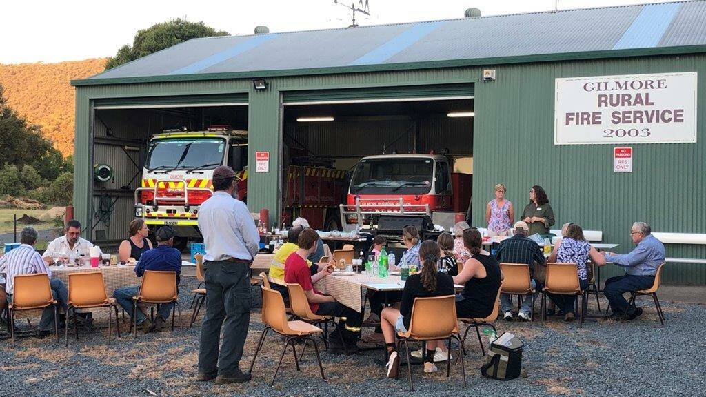 COME TOGETHER: Gilmore residents gather for a Fire Shed Friday event.