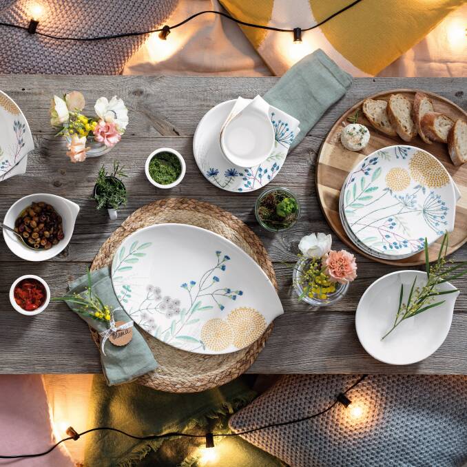 PRETTY SETTING: Decorating the table with flowers and other sprigs of foliage helps make a setting extra special. Flow Couture collection from $25.95. 