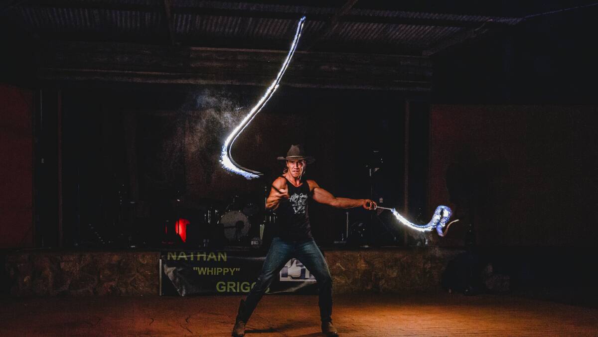 LIGHTNING WHIPS: One of Nathan 'Whippy' Griggs' trademark performances, setting his whips alight. Photo courtesy of Nathan 'Whippy' Griggs.