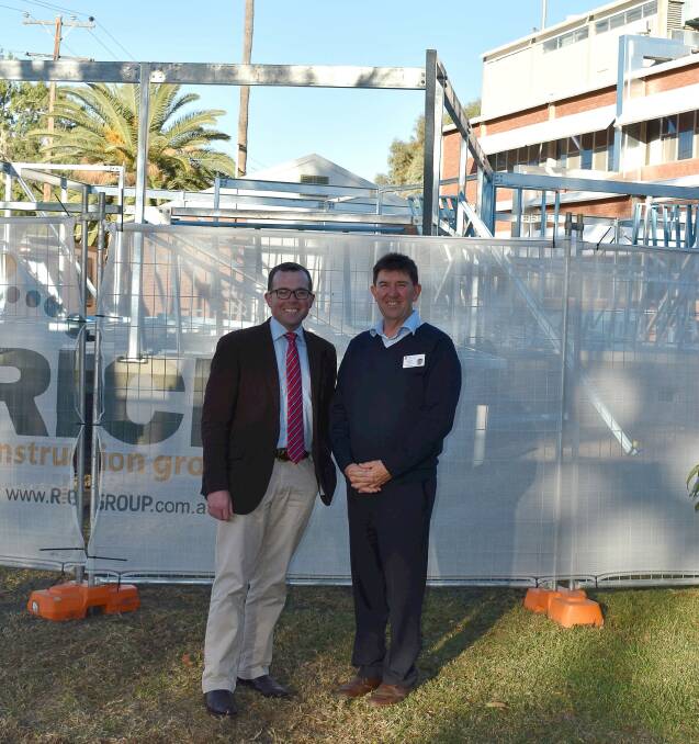 Northern Tablelands MP Adam Marshall, left, and Hunter New England Health Mehi Sector General Manager David Quirk outside the new renal unit construction site. Photo supplied by Adam Marshall's office.