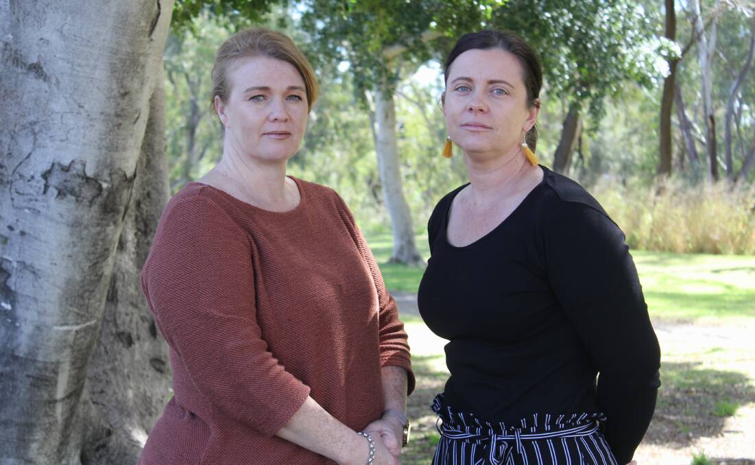 Tourism Moree chief Tammy Elbourne and her co-worker Jaymie McDonald both of whom have been isolated from their children at school in Queensland because of the border closure. Photo by Sophie Harris.