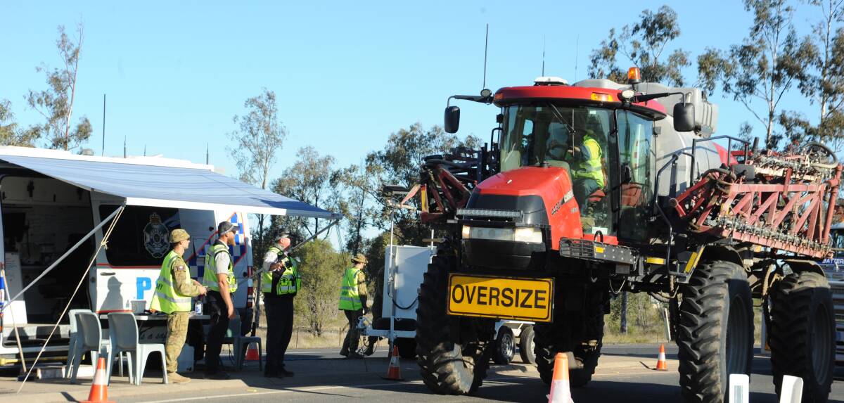 A spray rig stops at the border checkpoint at Goondiwindi.