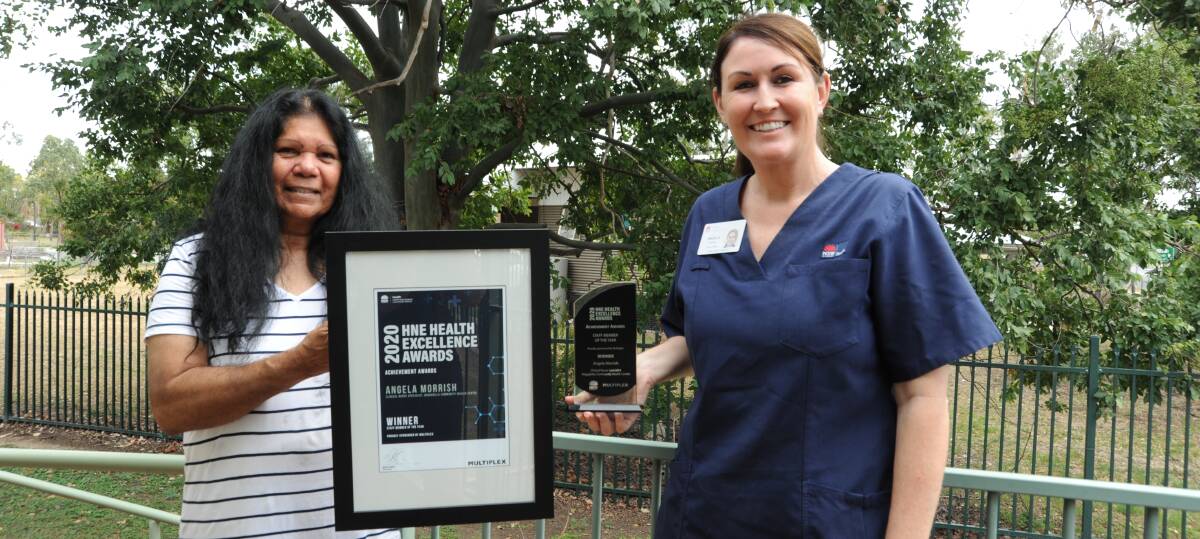 Hunter New England Health 'Staff Member of the Year' Angela Morrish and Boggabilla Community Health patient Shelly Binge with the award.