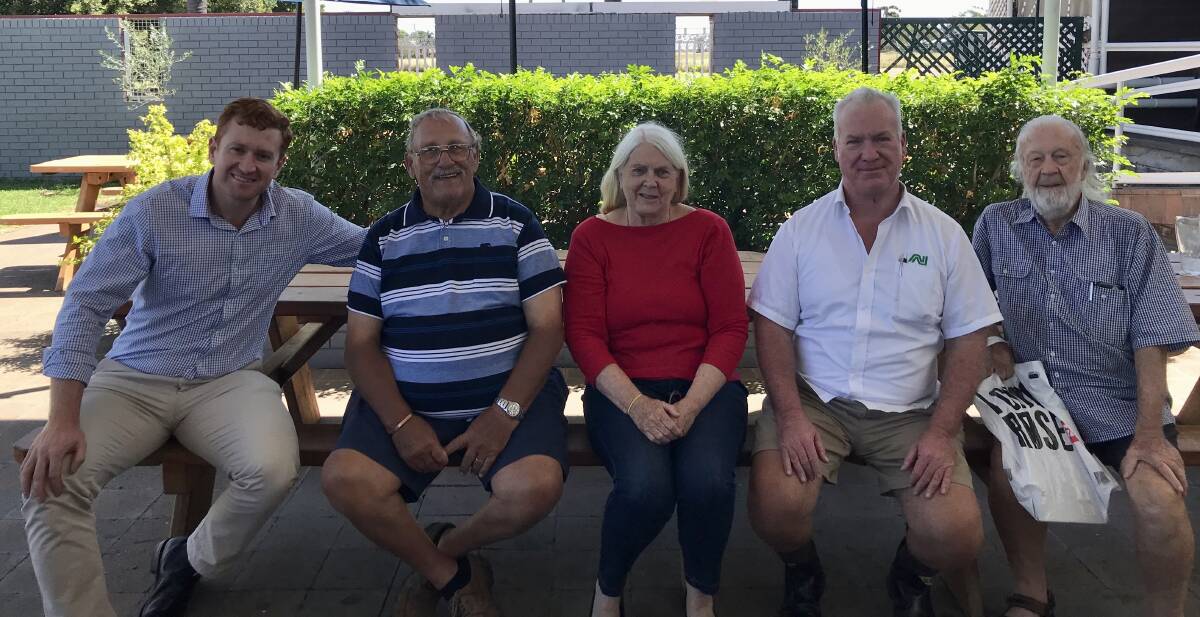 Labor candidate for the federal seat of Parkes, Jack Ayoub, meets with locals in Moree recently.