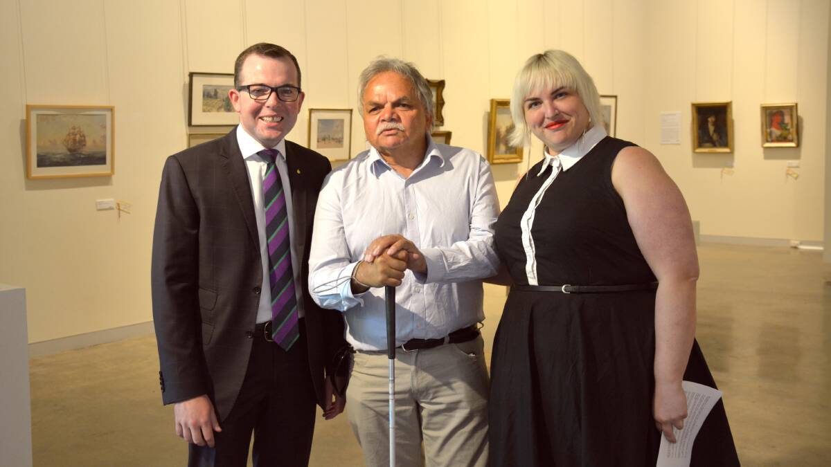 Northern Tablelands MP Adam Marshall, left, Anaiwan Elder and descendant of the Wirrayaraay survivors of the massacre Steve Widders and New England Regional Art Museum Project Director Rachel Parsons together at this morning's funding announcement. 
