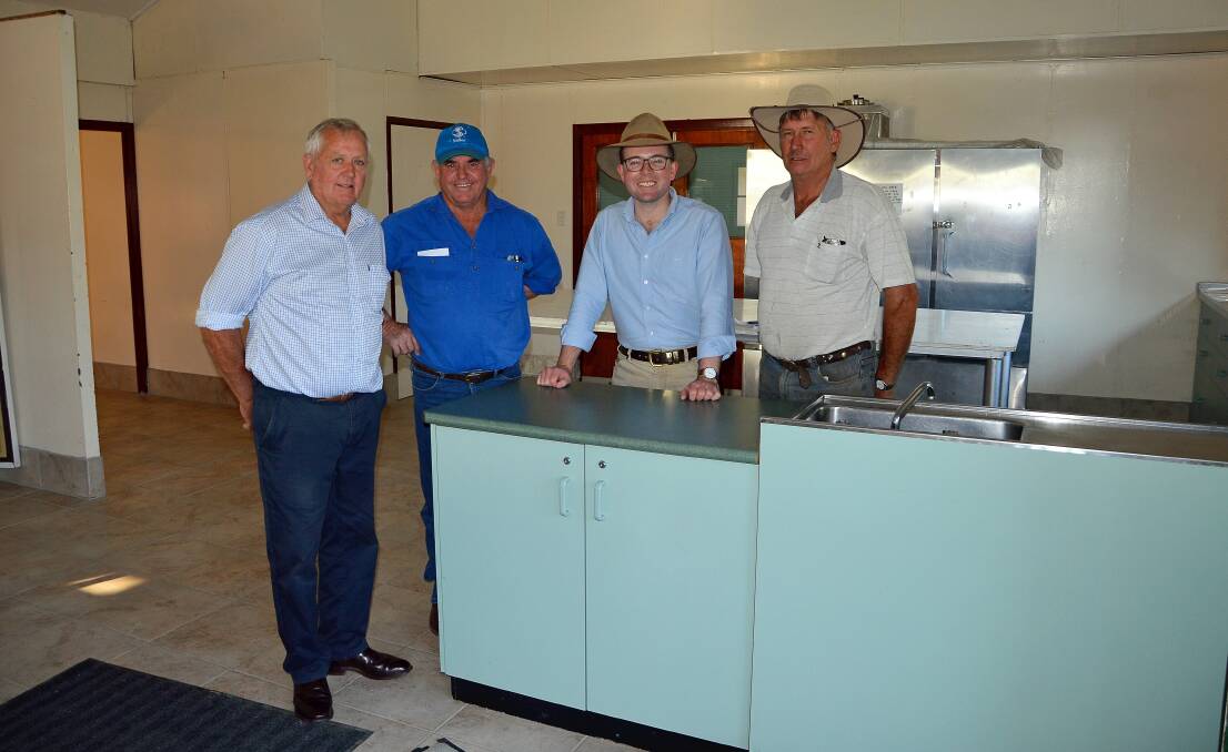 Gwydir Shire Mayor and Showground Trustee John Coulton, left, with Trust President David Moor, Northern Tablelands Adam Marshall and Trustee Lex Roberts in the preparation area of the kitchen.
