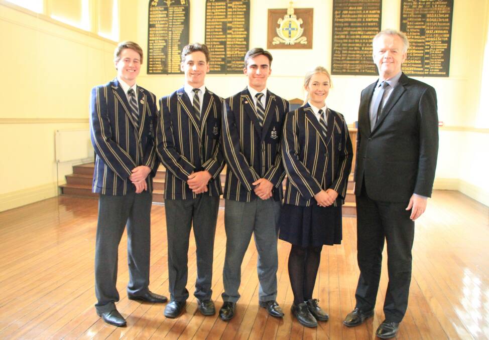 Headmaster Murray Guest with students Hamish Cannington, Nicholas Corderoy, William Forsyth and Tayla Frahm, who have been appointed to leadership positions at TAS for the coming year.