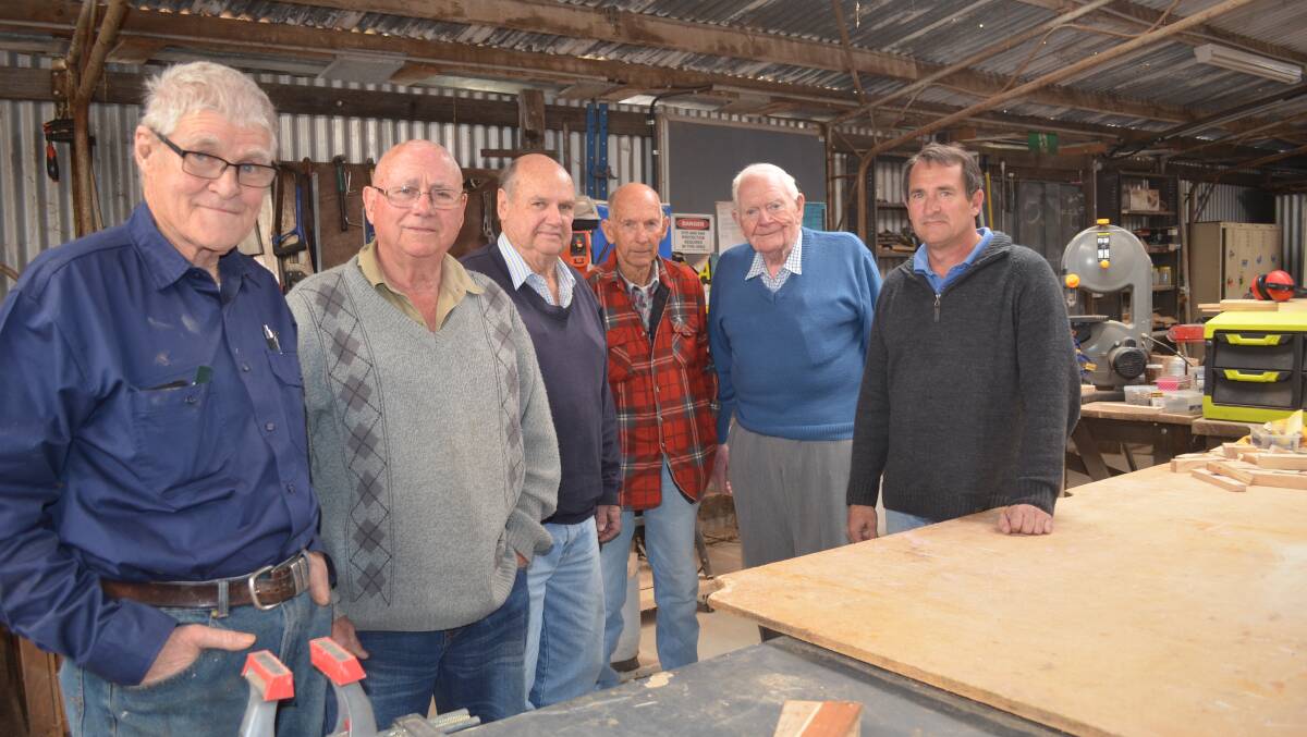 Creative bunch: Moree Men's Shed president Peter Sampson, John Latimer, John Officer, Ron Baker and Don Quast with AMSA executive officer David Helmers at the local shed.