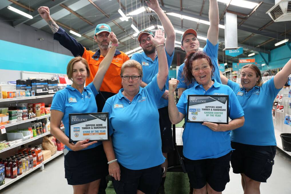 Well-deserved recognition: Dipper's Home Timber and Hardware's Rebecca Diprose, far left, with staff, clockwise from back at left; Mark Baker, Bayden Dorrington, Luke Cubis, Katie Francis, Cheryl Brazel and Heather Roberts.  