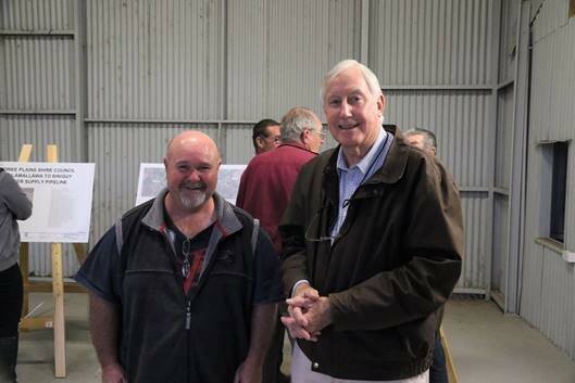 Biniguy resident Craig Moore with MPSC acting director of engineering Graham Macpherson at the Biniguy Community Information Session in August.