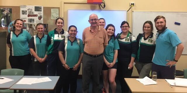Retired magistrate Chris Bone with MSC Year 12 legal studies students.