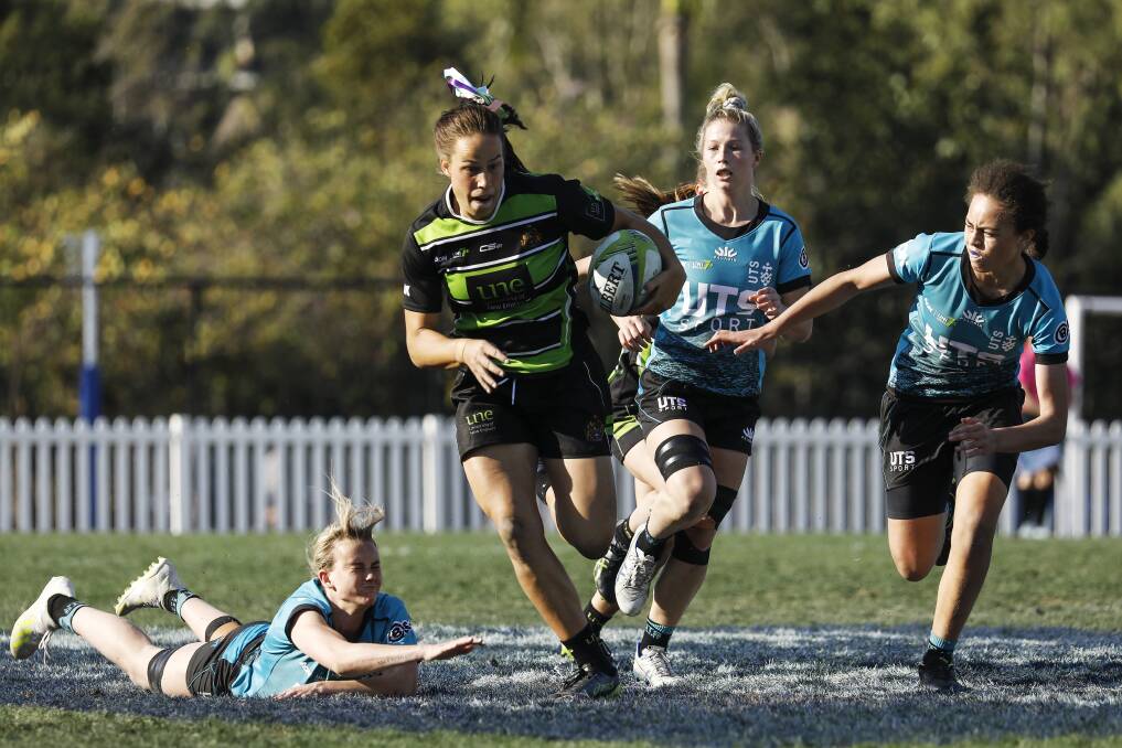 Star rising: Rhiannon Byers, here bursting through the line against UTS in the Aon Uni 7s, has been picked for the World Series. Photo: RugbyAU Media/Karen Watson. 