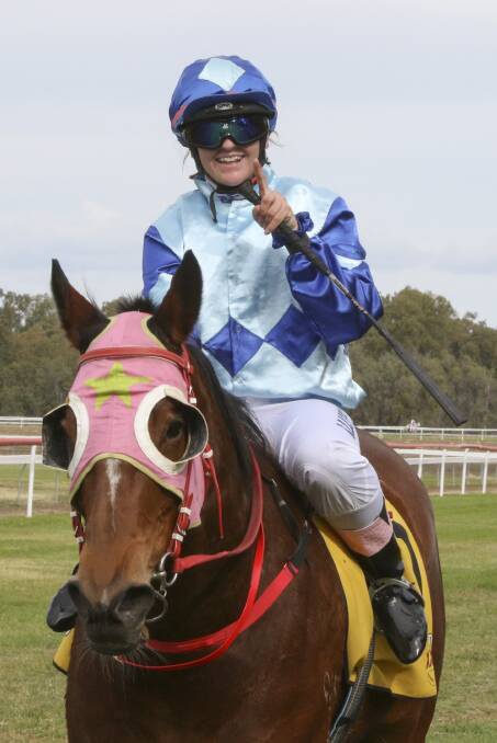 ALL SMILES: Angela Taylor was absolutely thrilled with her first win at the Moree Picnic Races. Photo: Bradley Photographers.