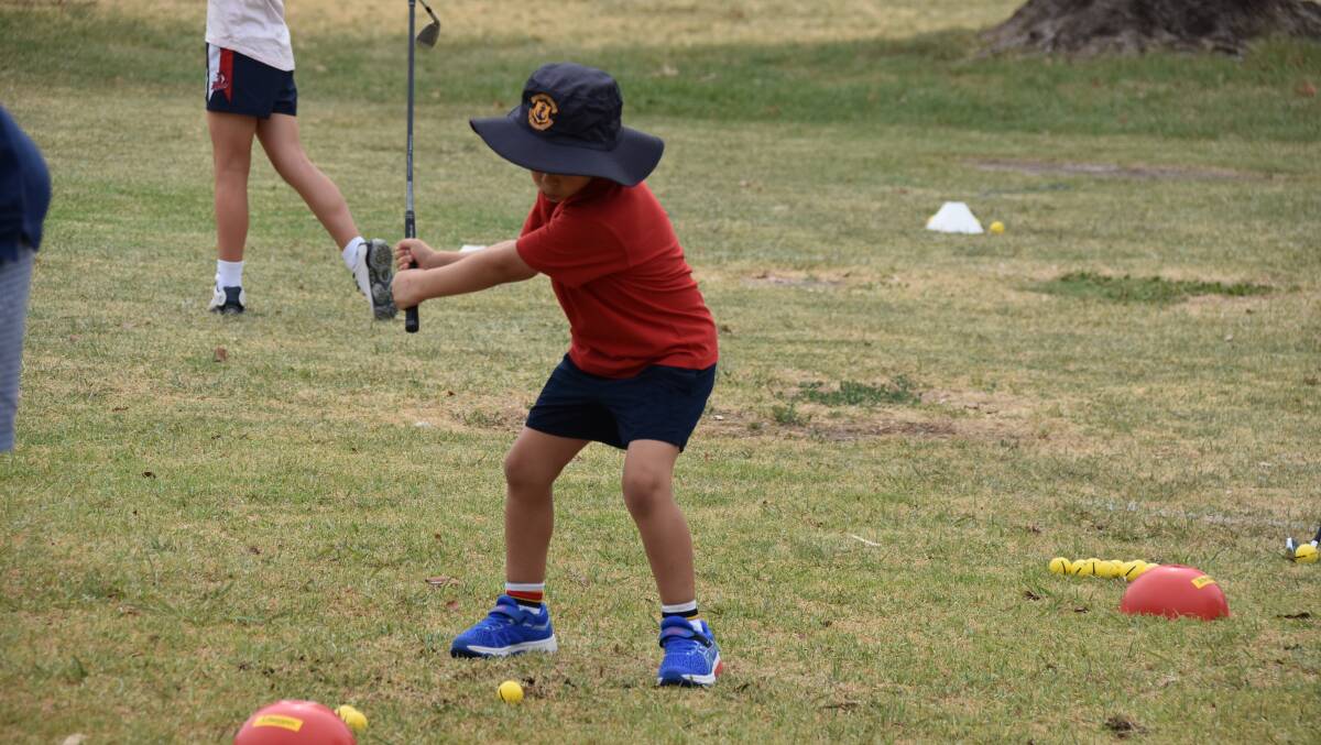 13 children enjoyed a clinic run by Moree Golf Club professional David Wright