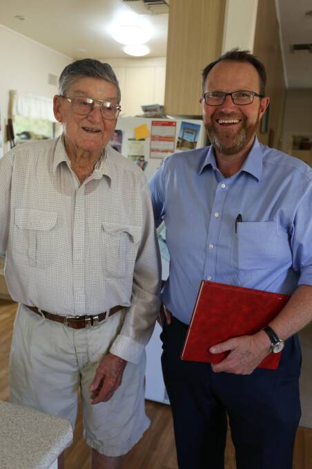 STORIES TO TELL: Gordon Stanger with C&W Financial Services' Trent Humphreys. Gordon is one of the firm's longest held clients, with his remarkable life story the source of great inspiration within the firm. Photo: Georgina Poole