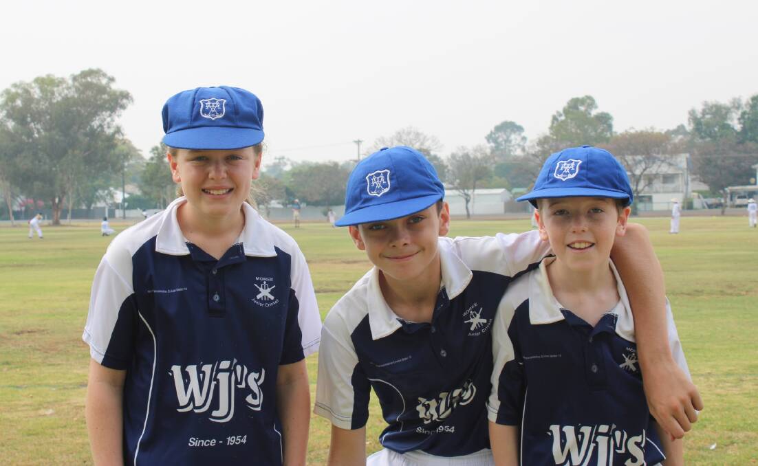 Moree under-12s players Anna Lamey, Kobi Annis Brown and Jack Farrell getting ready to take the field. Photo: supplied.
