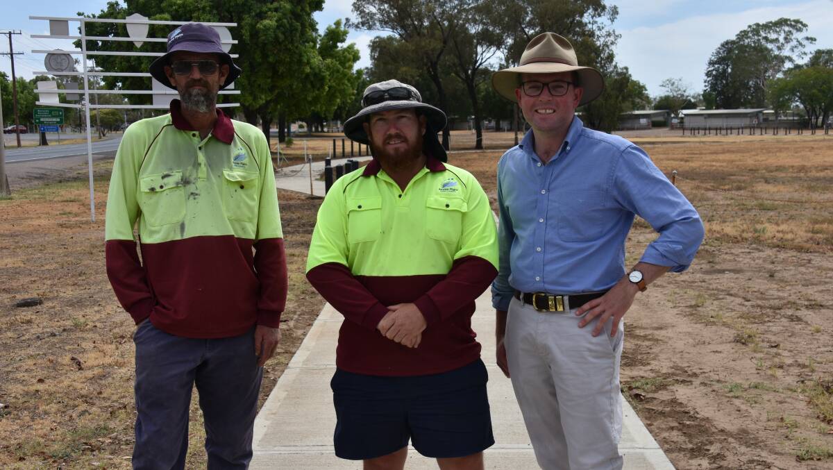 Urban crew lead hand Craig Mount, ganger Darren Colbran and Northern Tablelands MP Adam Marshall at the new shared pathway outside the Moree Racecourse.