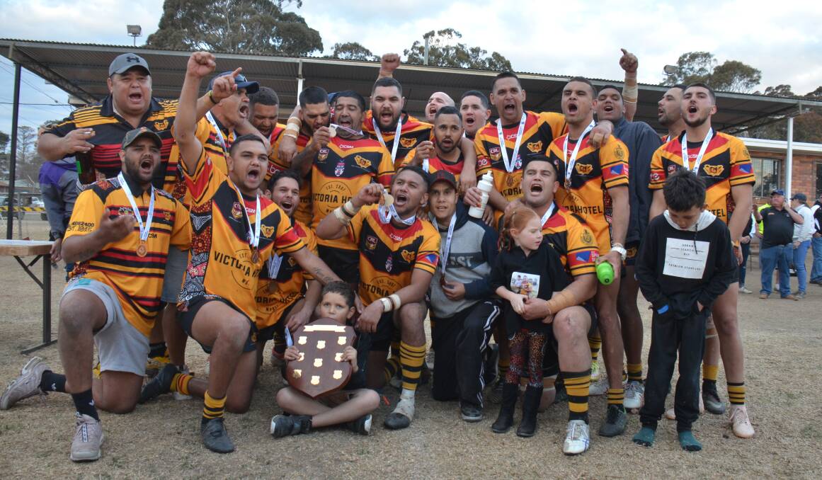 PREMIERS: The Moree Boomerangs celebrate an unbelievable victory over the Glen Innes Magpies in one of the great Group 19 grand finals. Photo: Ellen Dunger.