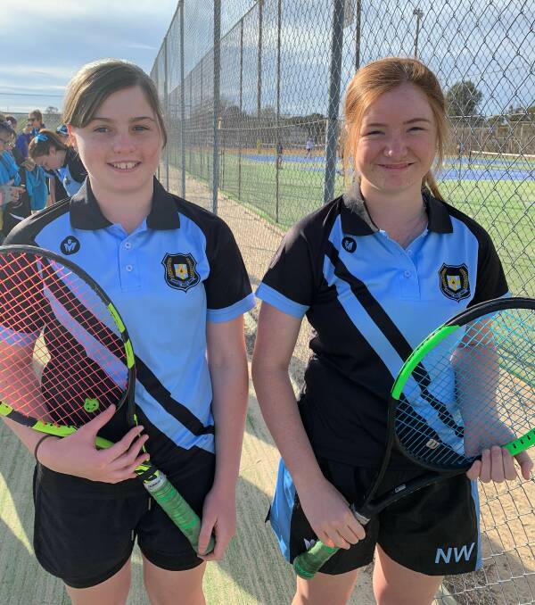 Moree Secondary College students Lauren Appleby and Chloe Flegerbein at the NSW Combined High Schools (CHS) secondary girls tennis championships in Inverell in September. Photo: supplied.