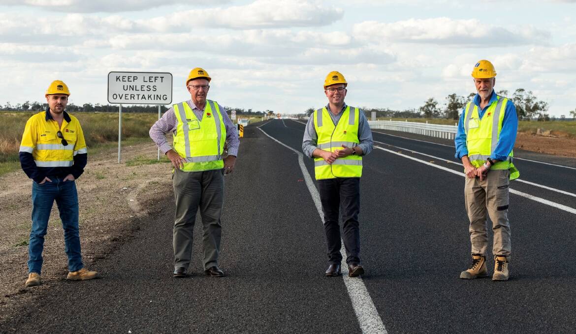 Newell Highway project manager Stuart Dearden, Member for Parkes Mark Coulton, Northern Tablelands MP Adam Marshall and Transport NSW head engineer John Harrison inspect the completed stretch of the Newell Highway.