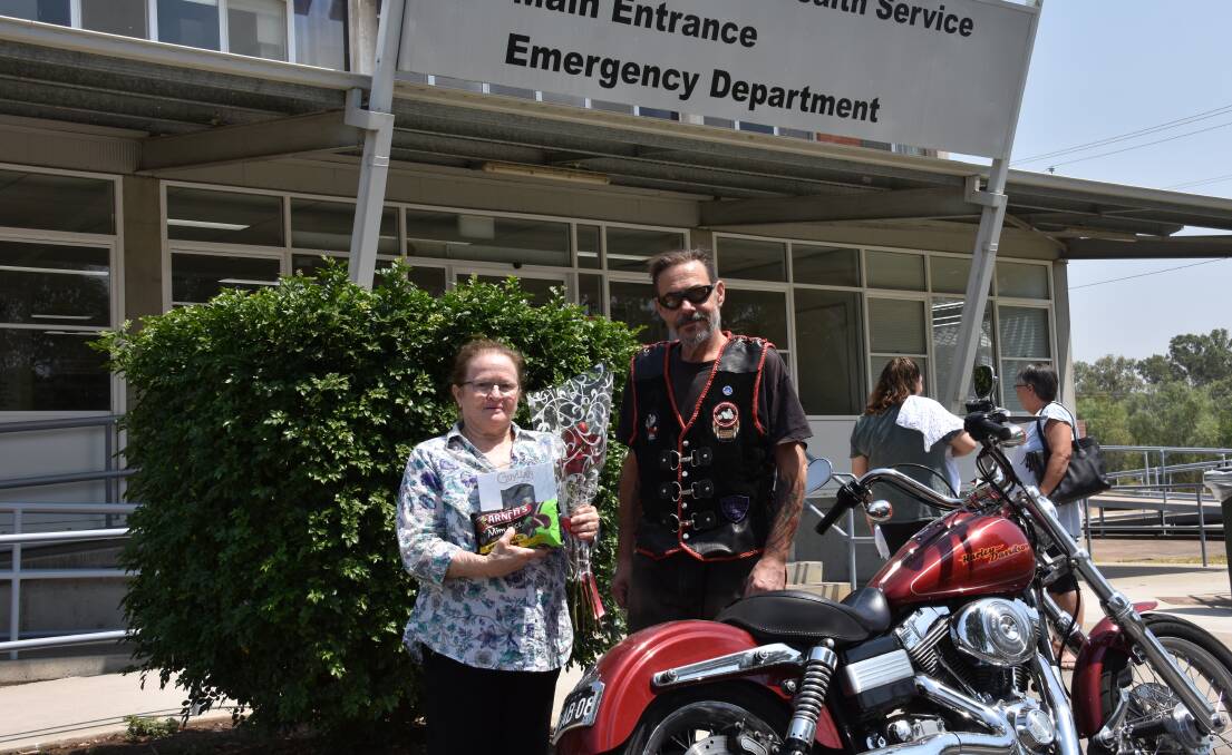 SPREADING THE LOVE: Linda Barnett receives the gifts from Kings Cross Bikers' Pete Rawson at the Moree Hospital