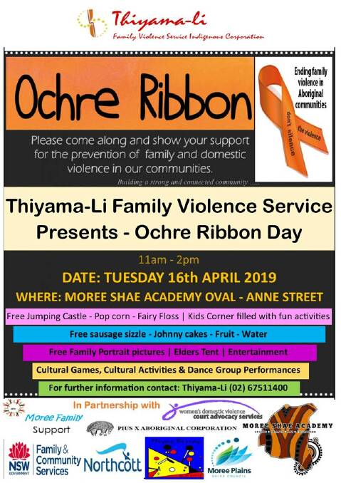 Thiyama-Li holding Ochre Ribbon Day