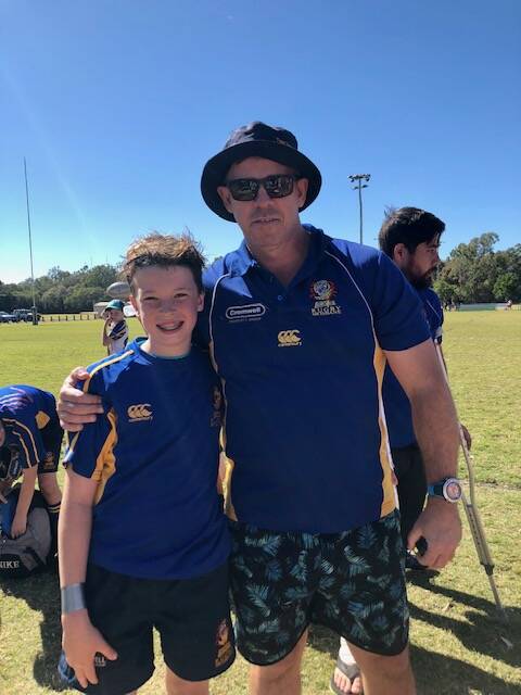 Easts Tigers manager Joey Greer with son Sam.
