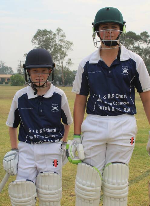Moree under-14s players Lachlan Muggleton and Harry George about to open the batting. Photo: supplied.