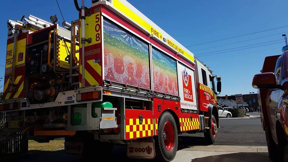 EARLY START: A Tamworth tanker, as part of New England strike force, poised to help in Casino with fires raging on the North Coast. Photo: FRNSW
