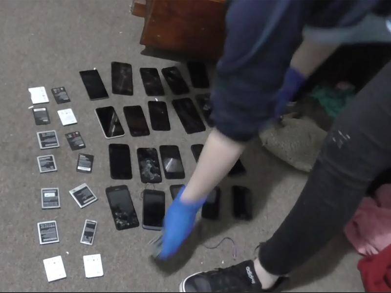 NSW Police have uncovered a stash of mobile phones during their investigation into a brutal bashing.