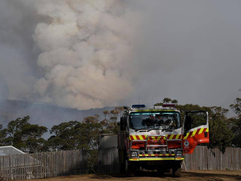 Fires across NSW's southeast are flaring up amid high temperatures and strong winds.