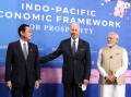 (L-R) Prime Minister Fumio Kishida, Joe Biden and Prime Minister Narendra Modi at the launch.